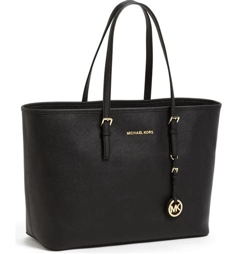 michael kors gold drawstring purse|Michael Kors saffiano leather tote.